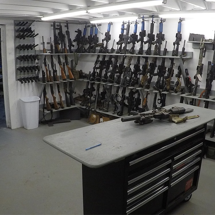 A picture showing the inside of the gun safe at Assymetric Solutions' Missouri location